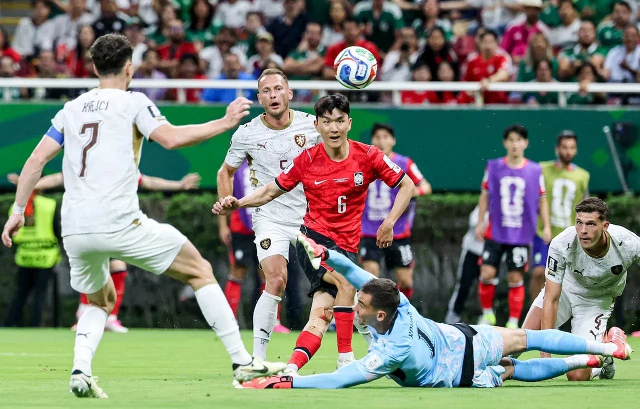 South Korea player attempting to score against Czech Republic South Korea player attempting to score against Czech Republic