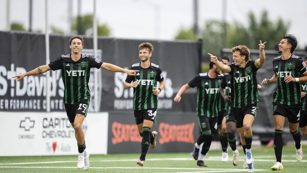 Austin II players celebrating a goal Austin II players celebrating a goal