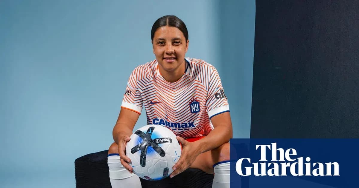 Player posing with soccer ball in studio setting Player posing with soccer ball in studio setting