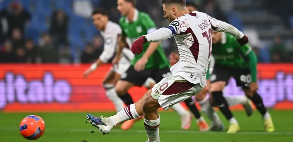 Player taking a penalty kick during match Player taking a penalty kick during match