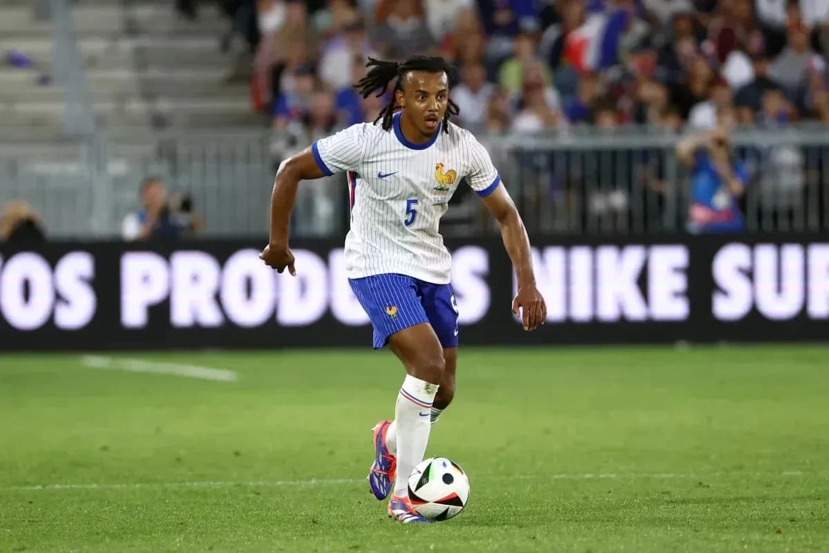 Player dribbling ball during football match Player dribbling ball during football match