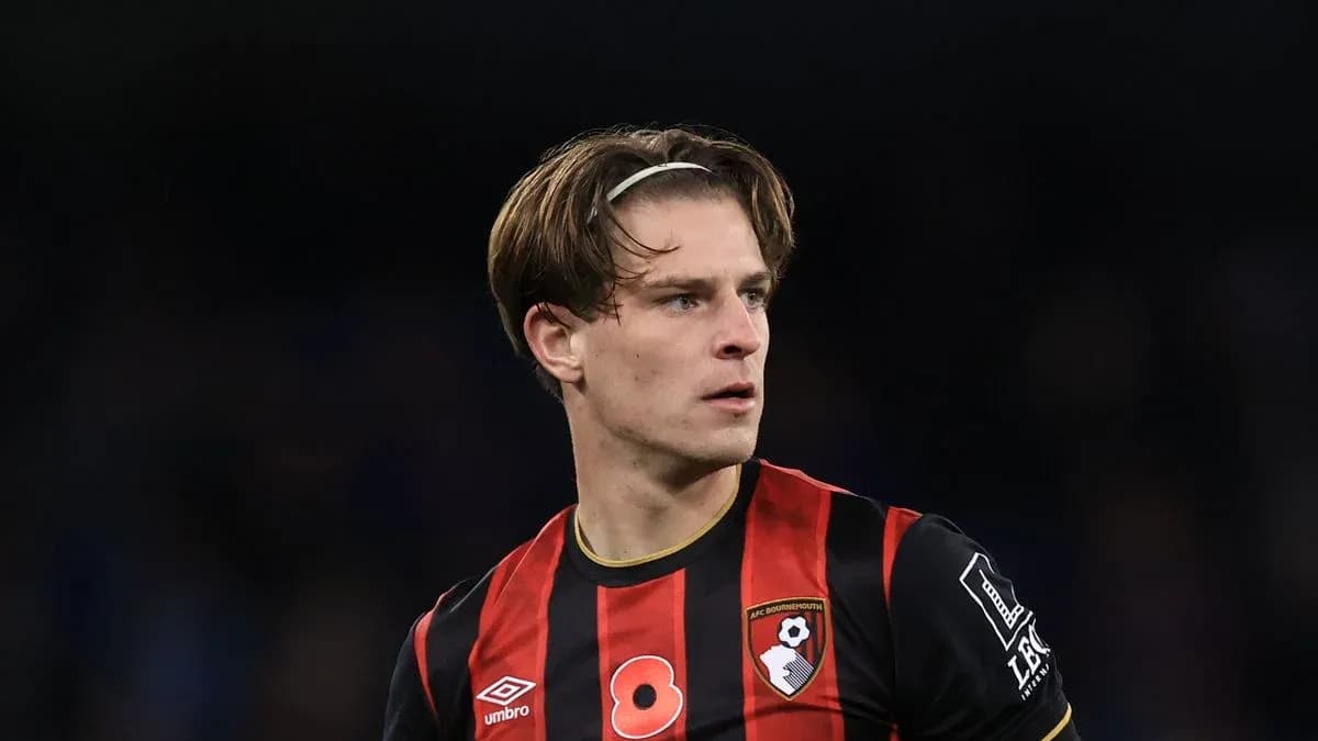 Bournemouth player looking focused on the field Bournemouth player looking focused on the field
