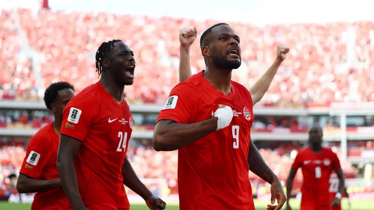 Canada players celebrating during World Cup qualifying match Canada players celebrating during World Cup qualifying match