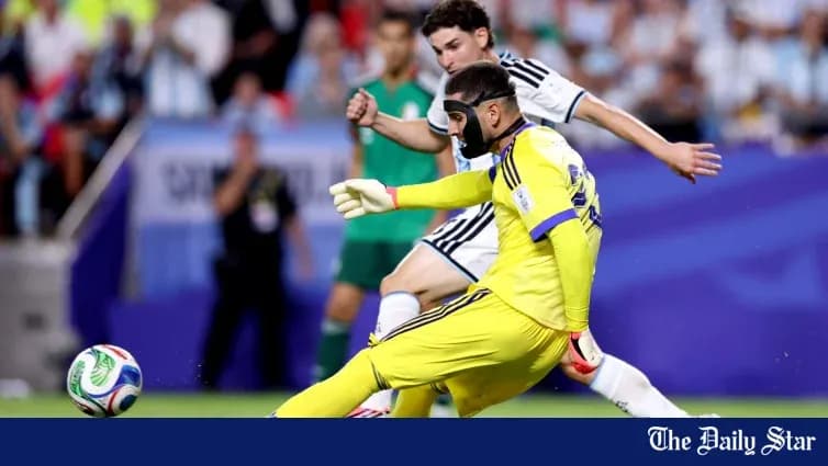 Goalkeeper in yellow making a save during match Goalkeeper in yellow making a save during match