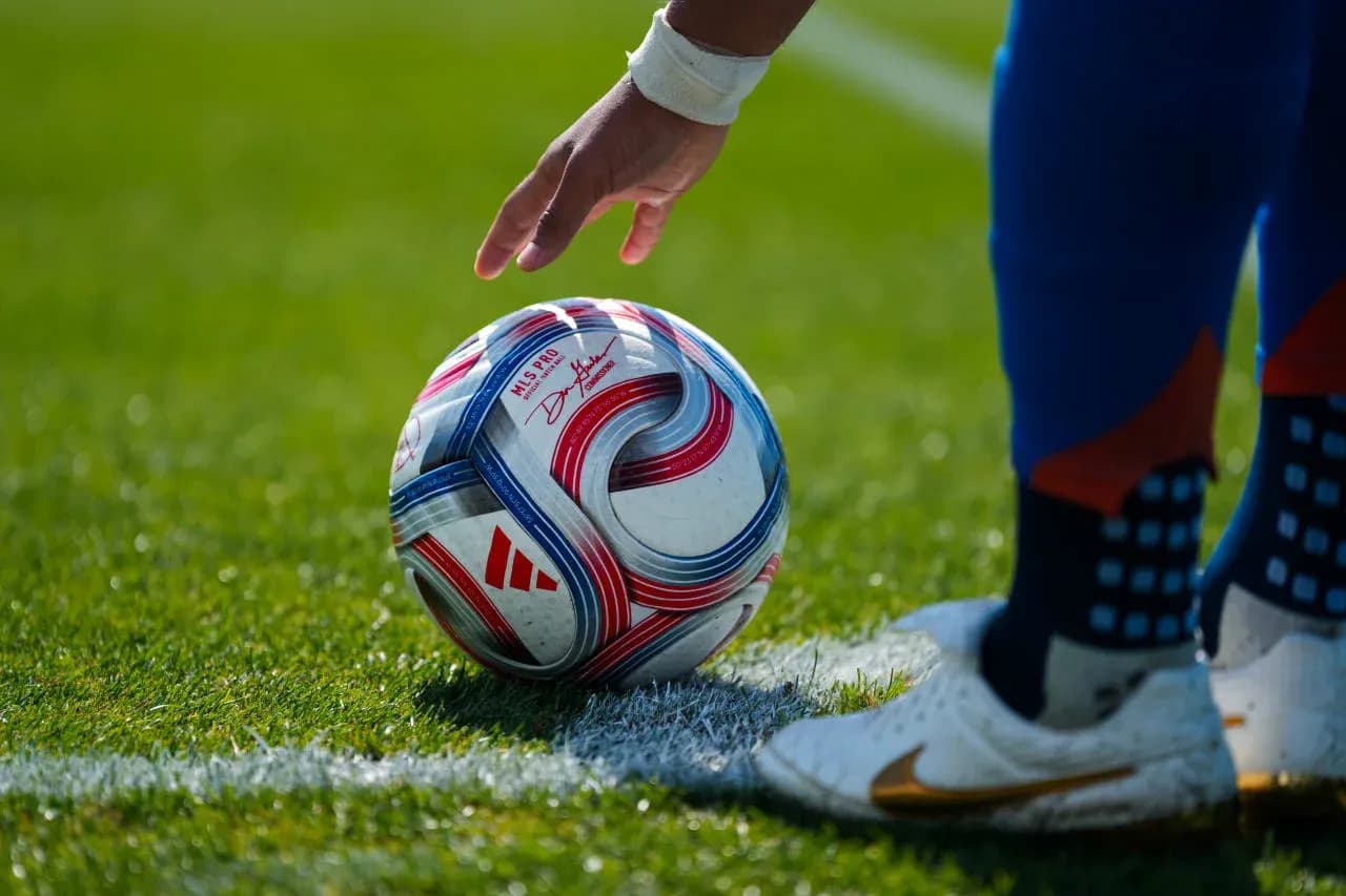 Player preparing to kick a soccer ball Player preparing to kick a soccer ball