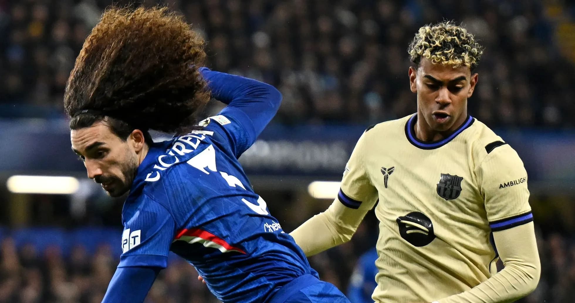 Players competing for the ball during a match Players competing for the ball during a match