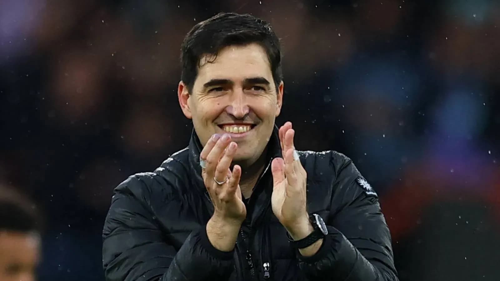 Manager applauding during a match celebration Manager applauding during a match celebration