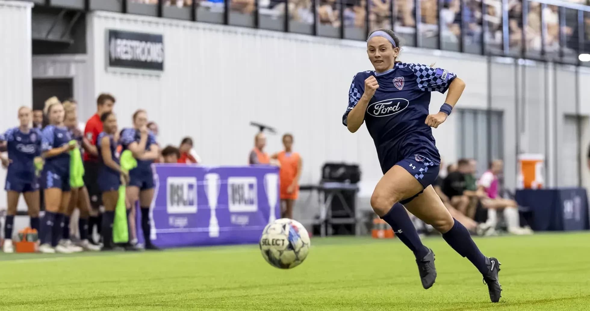 Player running with the ball during match Player running with the ball during match