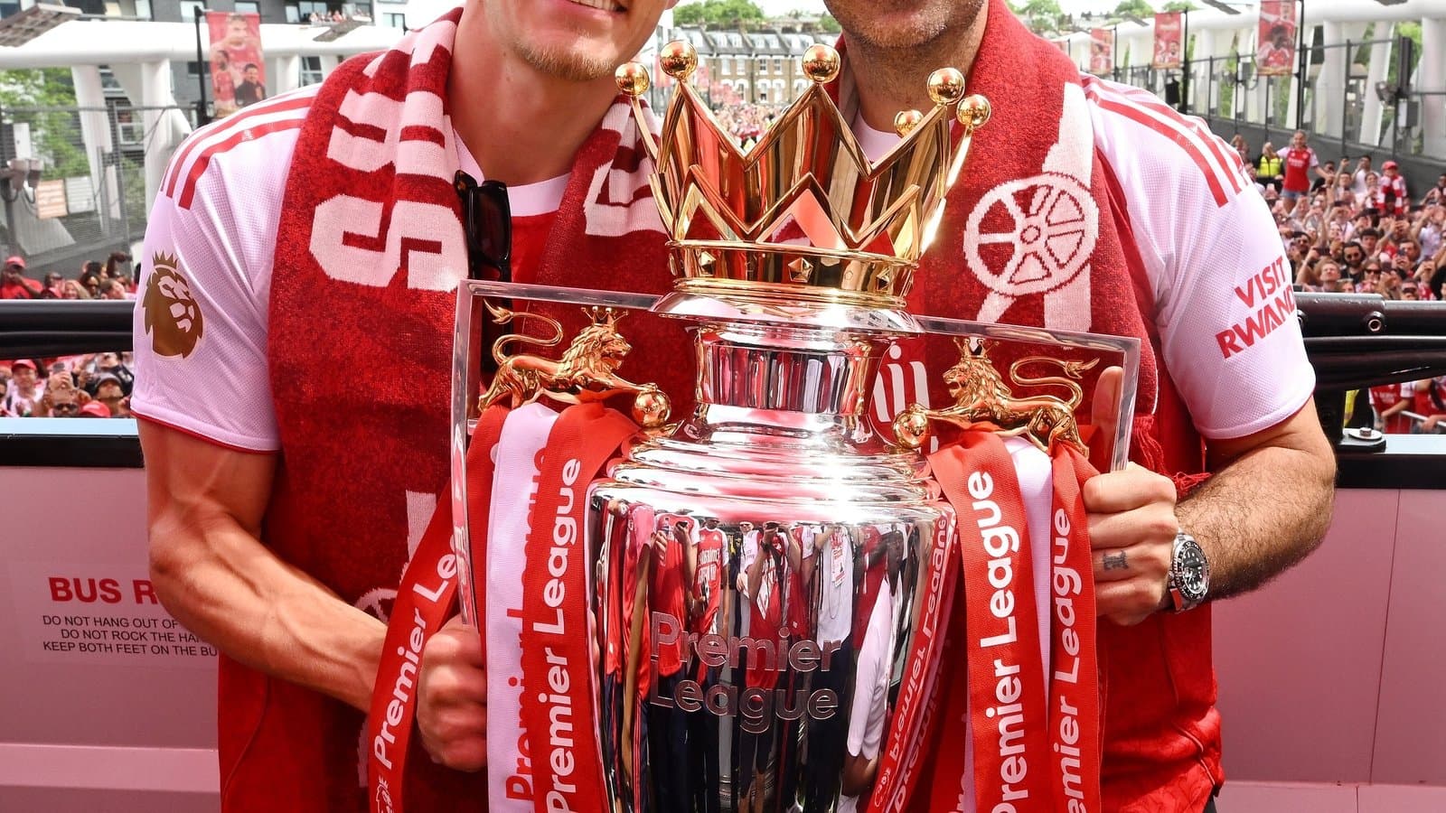 Players celebrating with Premier League trophy at parade Players celebrating with Premier League trophy at parade