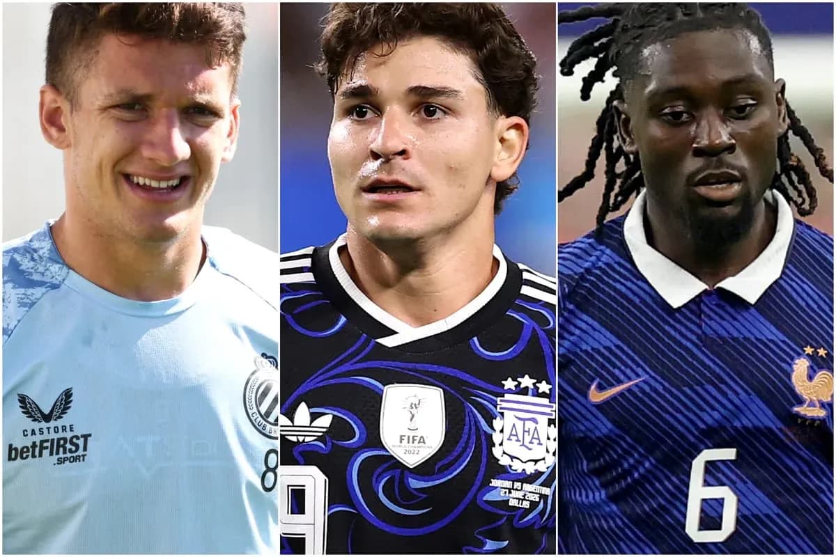 Three soccer players in team jerseys facing forward Three soccer players in team jerseys facing forward