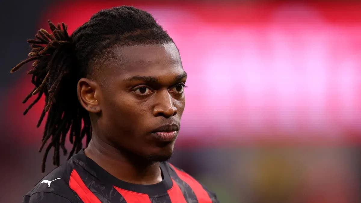 Player with dreadlocks in a black and red jersey Player with dreadlocks in a black and red jersey