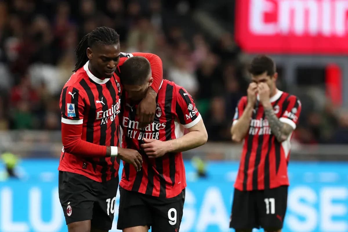 AC Milan players comforting each other after match AC Milan players comforting each other after match