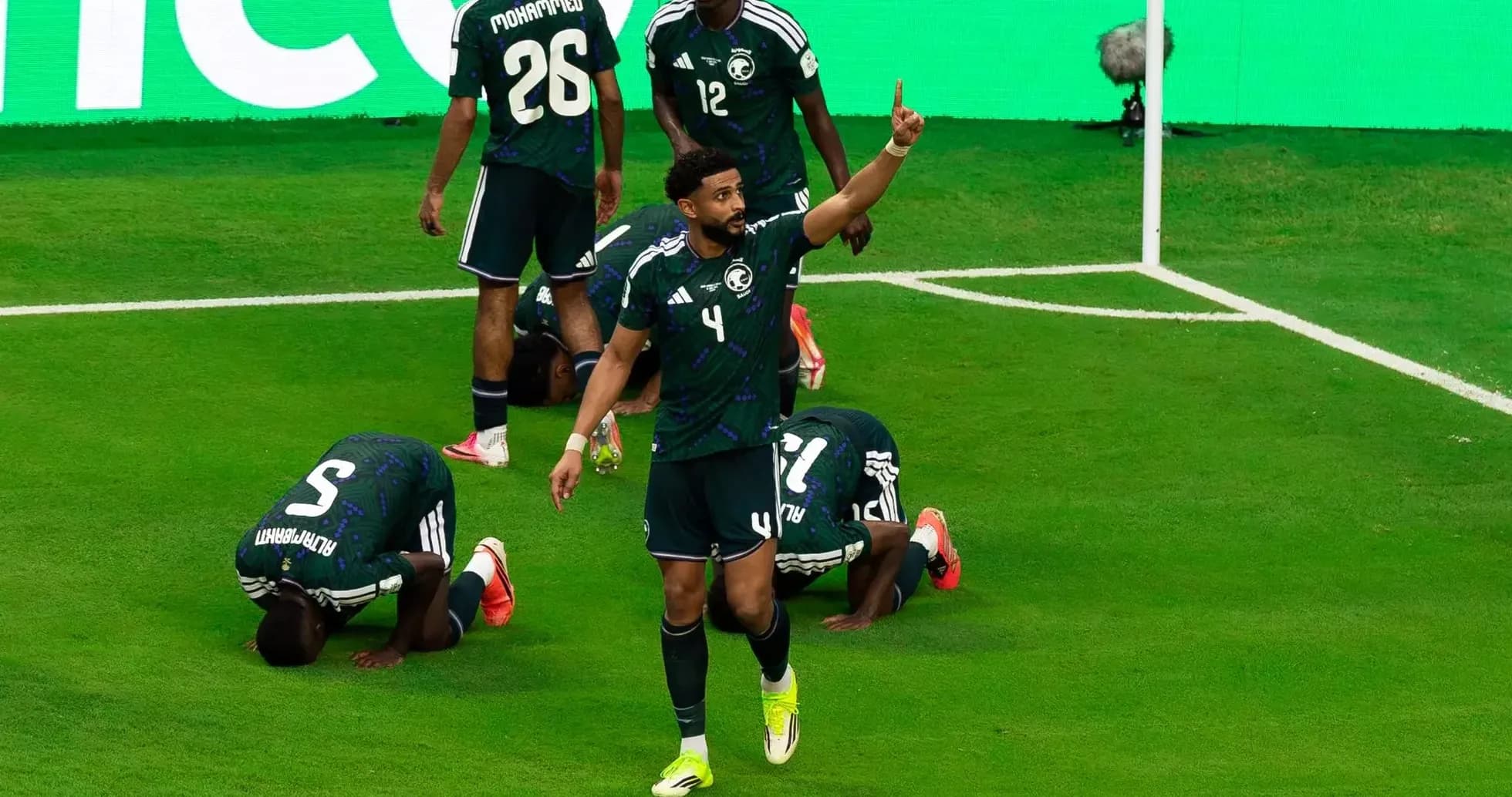 Saudi players celebrating a goal during match Saudi players celebrating a goal during match