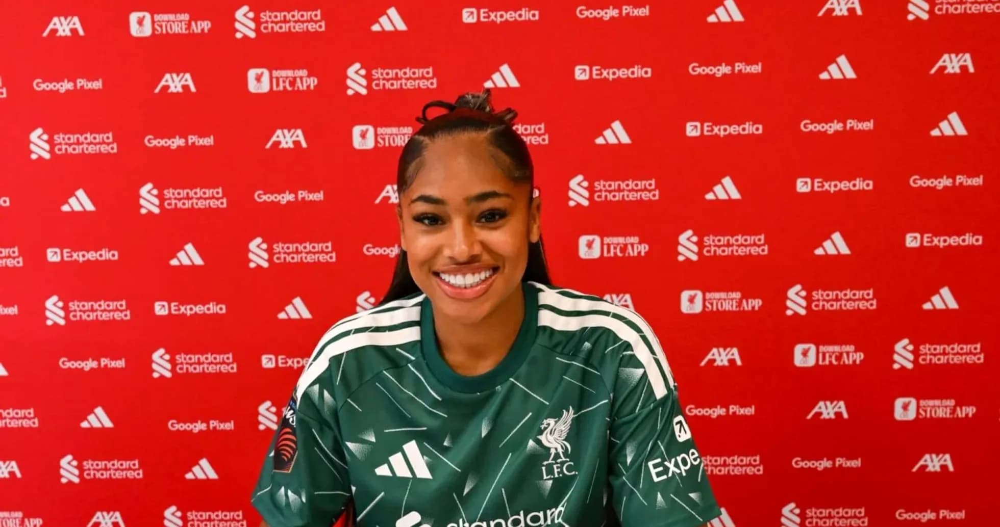 Player smiling during press conference at Liverpool FC Player smiling during press conference at Liverpool FC