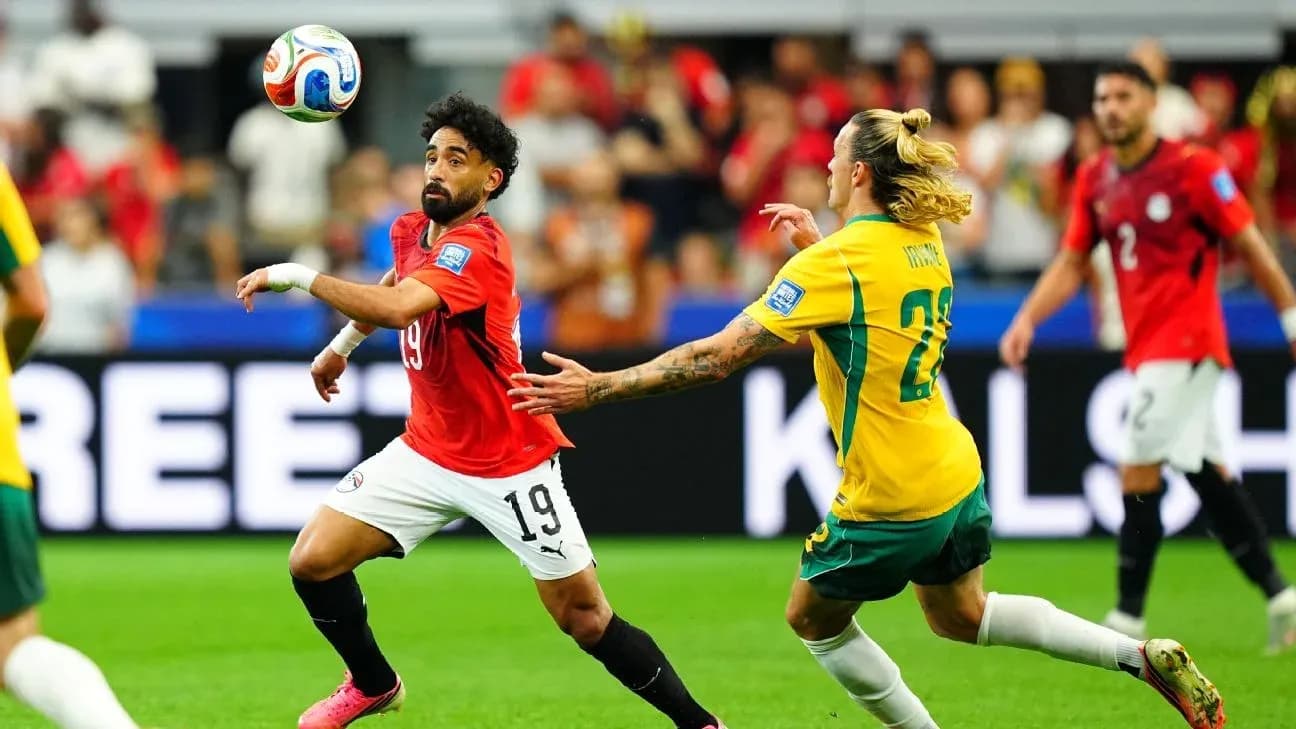 Egyptian player attempting to control ball against Australia Egyptian player attempting to control ball against Australia