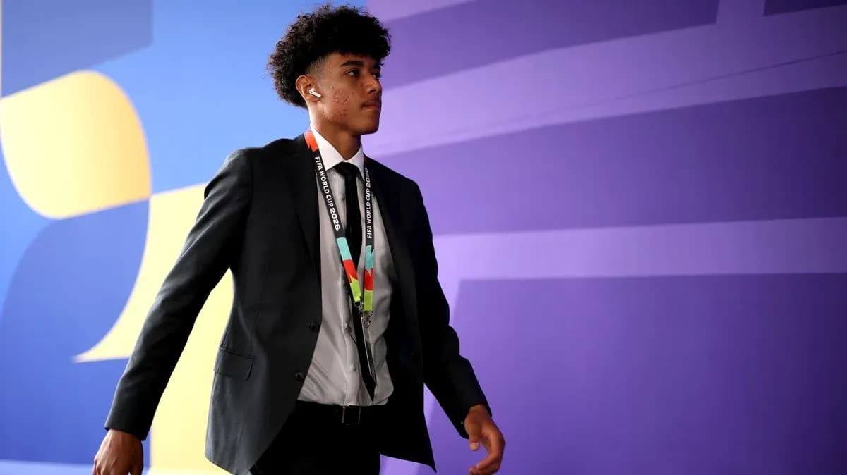 Player arriving at venue wearing a suit Player arriving at venue wearing a suit