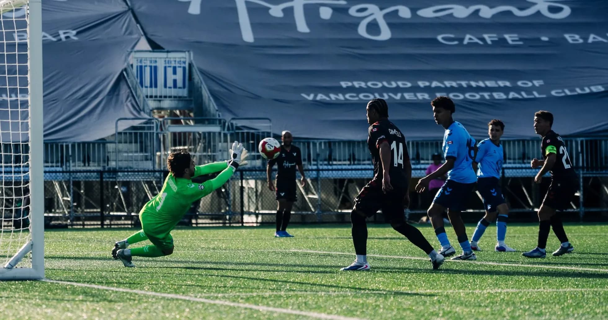 Goalkeeper making a save during match Goalkeeper making a save during match