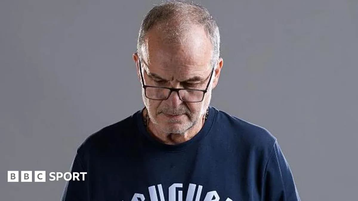 Man wearing glasses looking down thoughtfully Man wearing glasses looking down thoughtfully