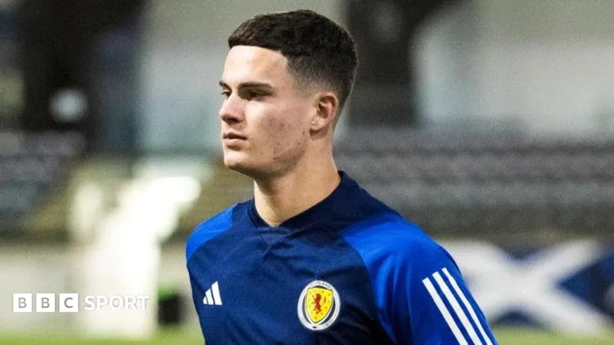 Player in Scotland training kit on pitch Player in Scotland training kit on pitch