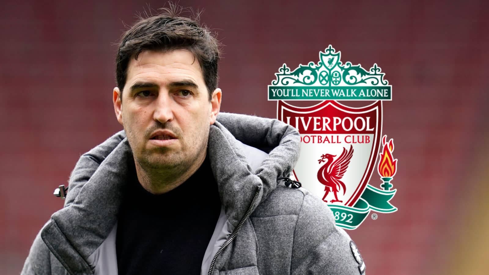 Coach in front of Liverpool FC logo backdrop Coach in front of Liverpool FC logo backdrop