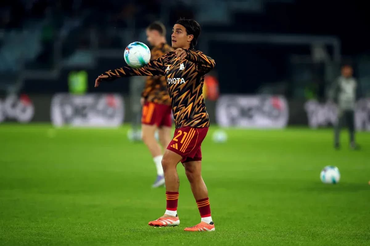Player practicing ball control during warm-up session Player practicing ball control during warm-up session