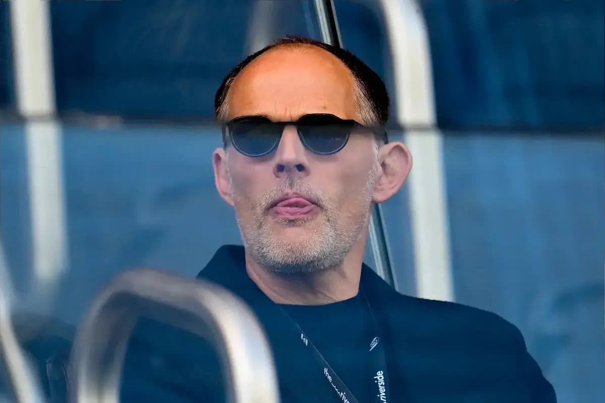 Man wearing sunglasses in a stadium box Man wearing sunglasses in a stadium box