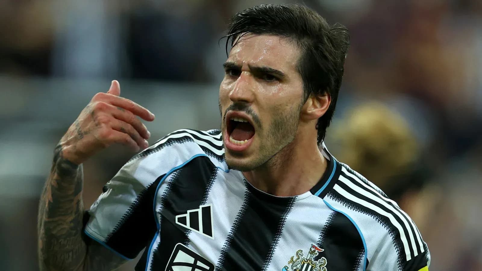 Player celebrating passionately during a match Player celebrating passionately during a match