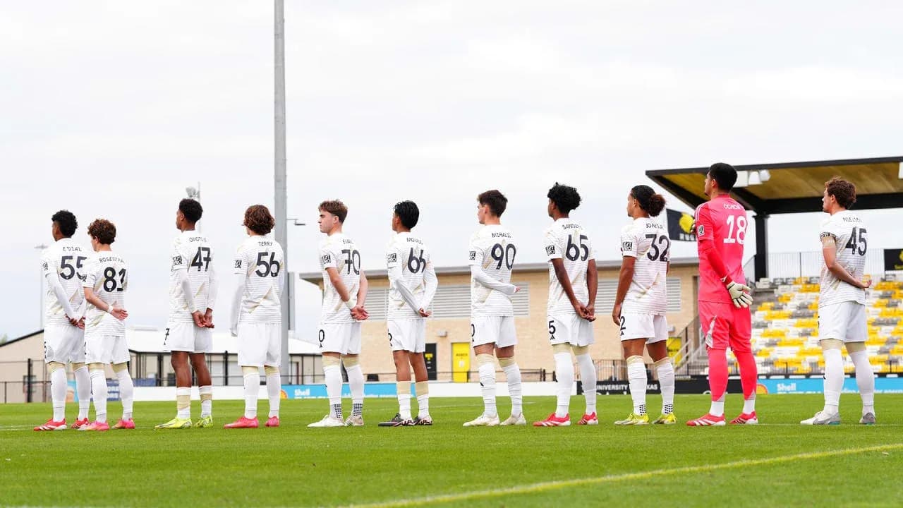 Vancouver Whitecaps II players standing in formation Vancouver Whitecaps II players standing in formation