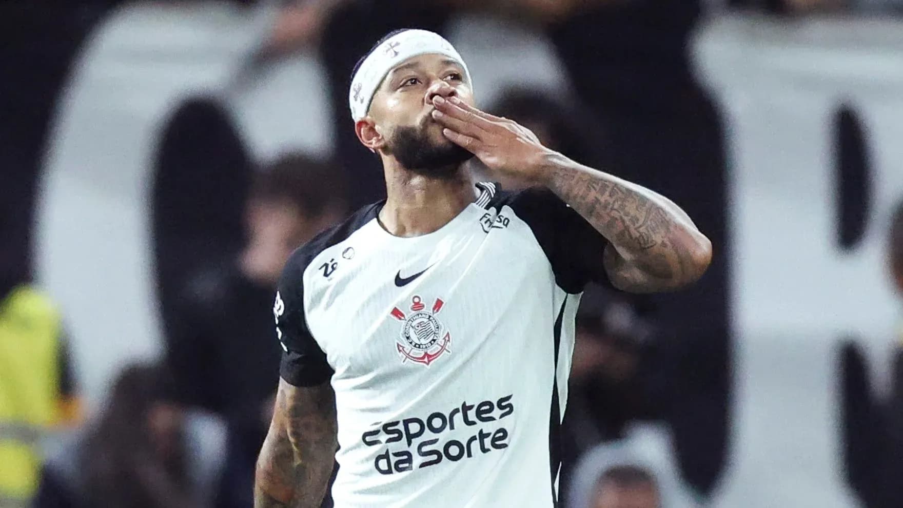 Player celebrating with a kiss gesture after scoring Player celebrating with a kiss gesture after scoring