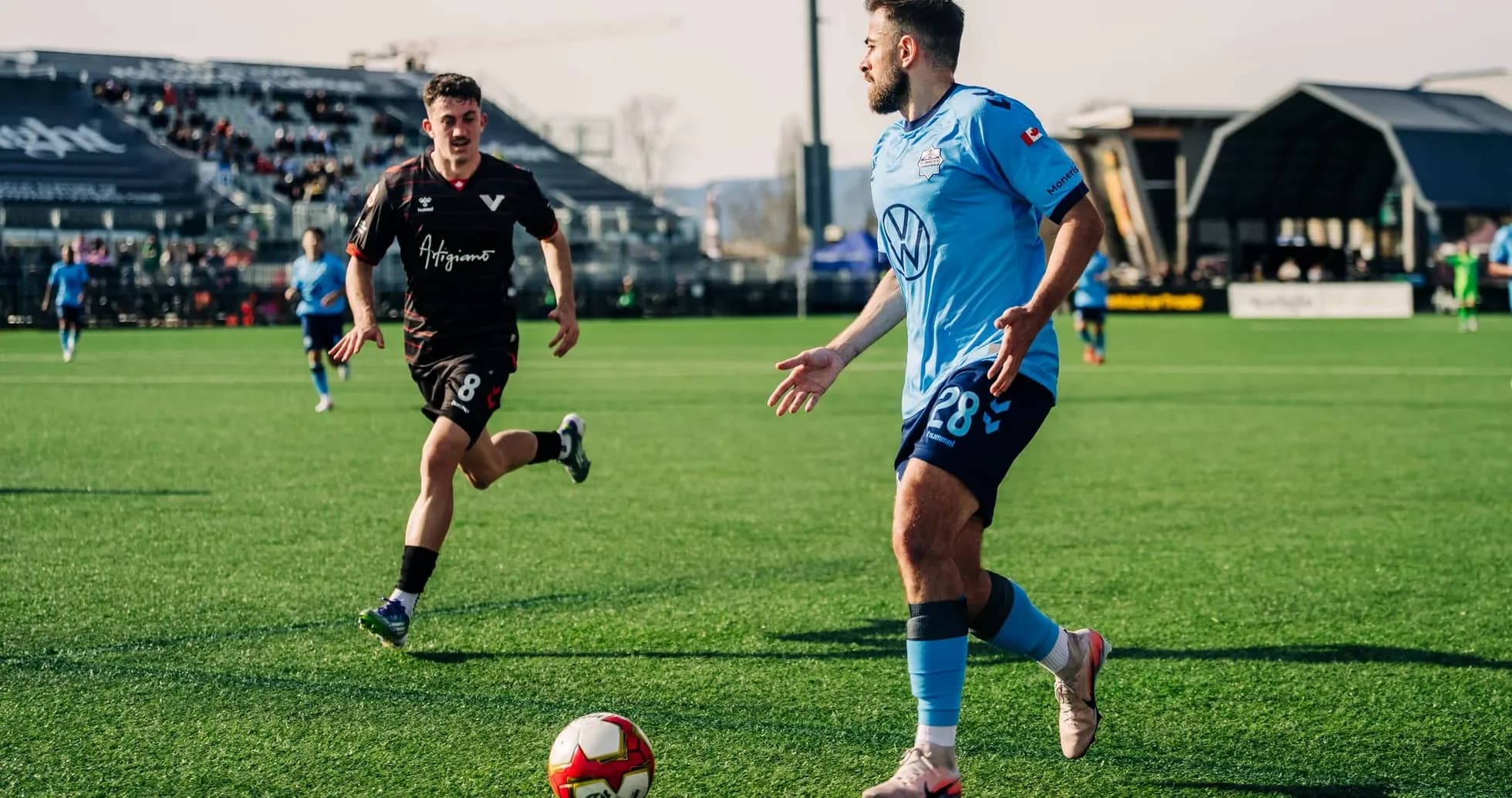 HFX Wanderers FC player dribbling the ball HFX Wanderers FC player dribbling the ball