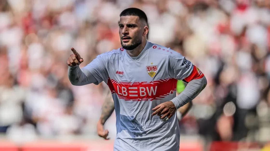 Player celebrating during a match in team jersey Player celebrating during a match in team jersey