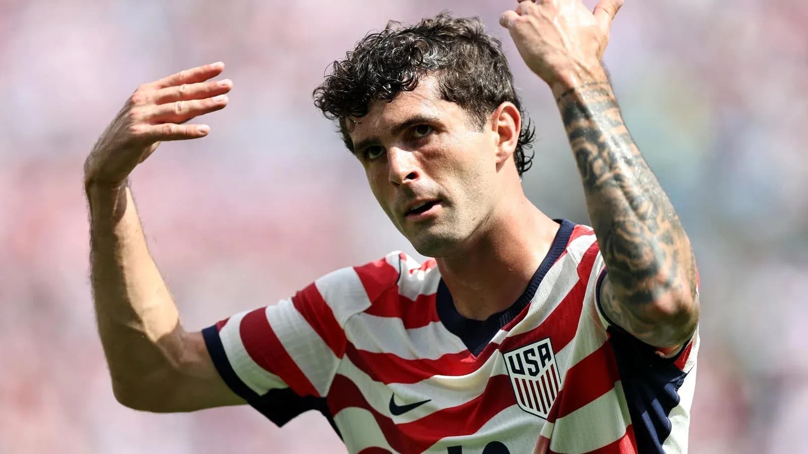 Player gesturing during a soccer match Player gesturing during a soccer match