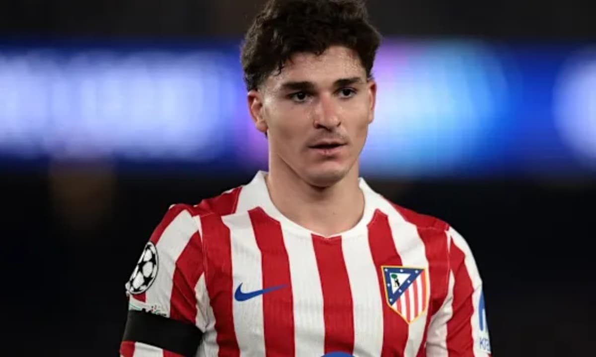 Player wearing Atlético Madrid jersey on the field Player wearing Atlético Madrid jersey on the field