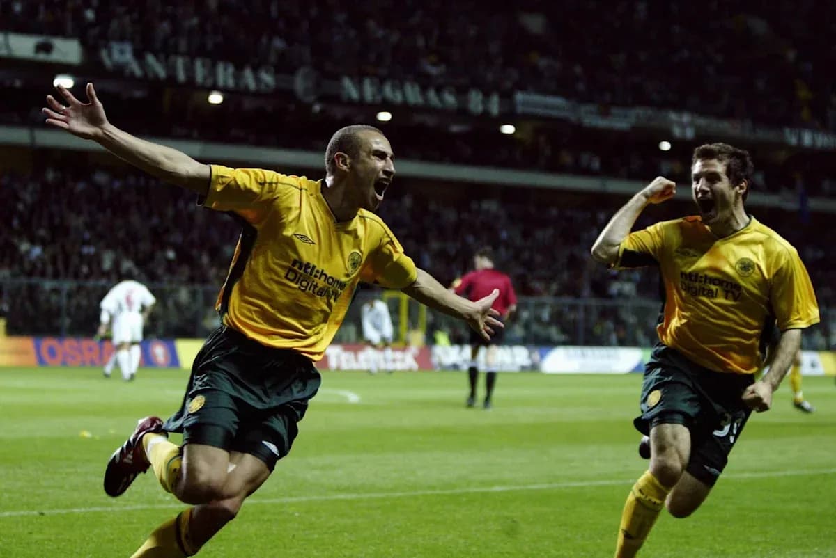 Players celebrating a goal on the field Players celebrating a goal on the field