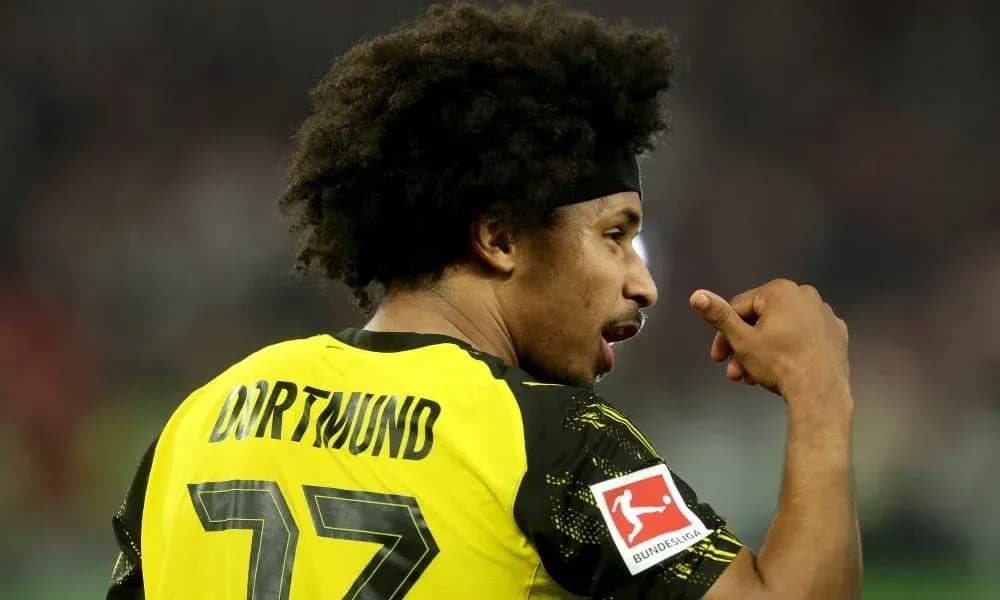 Player in Dortmund jersey celebrating during match Player in Dortmund jersey celebrating during match