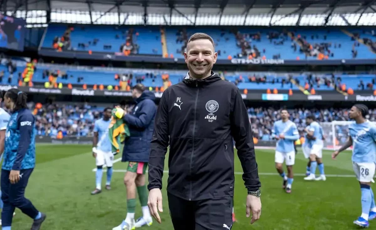 Manager walking off the pitch after match Manager walking off the pitch after match
