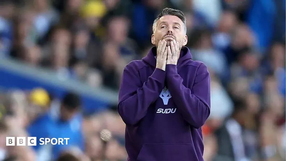 Coach reacting during a tense moment in match Coach reacting during a tense moment in match