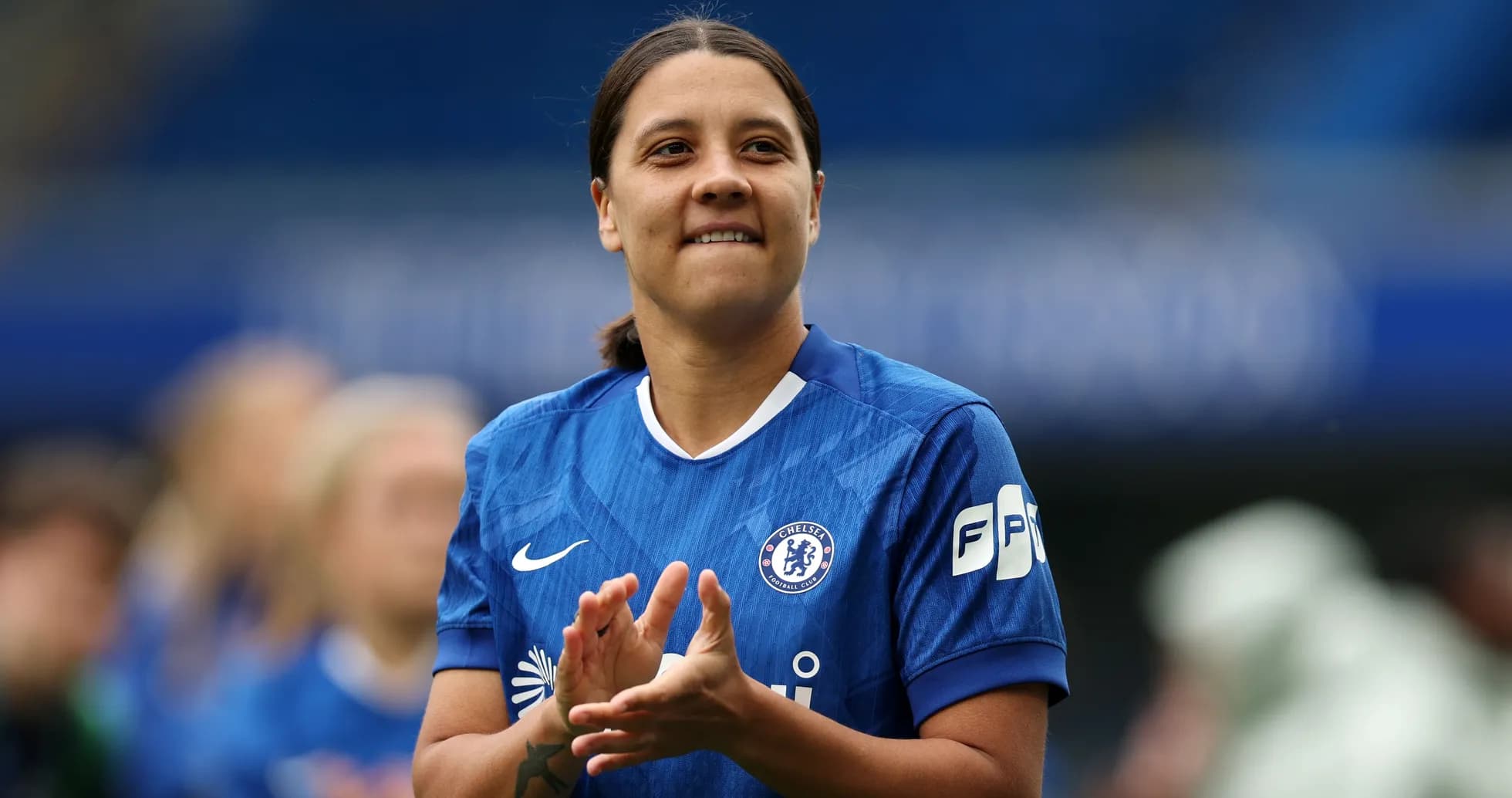 Player applauding while wearing Chelsea kit Player applauding while wearing Chelsea kit