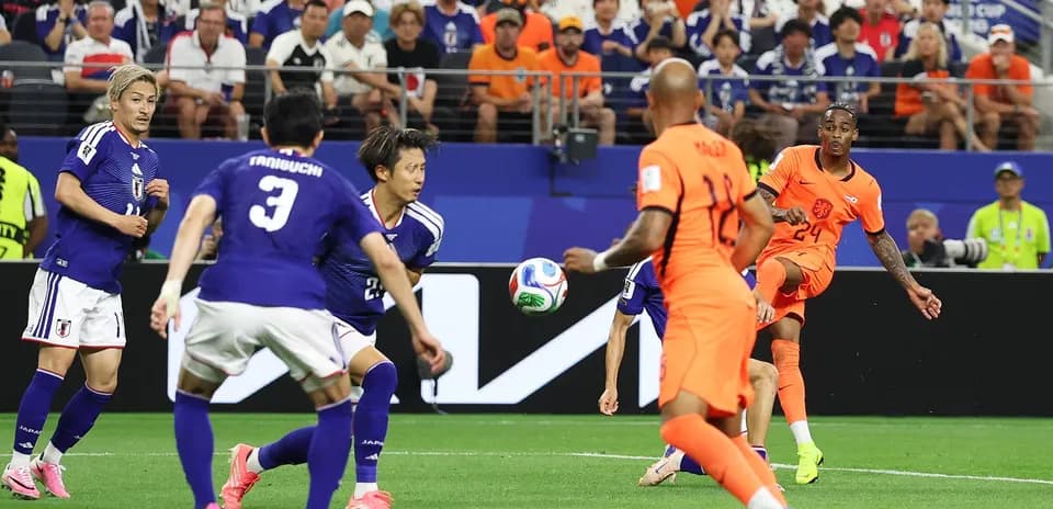 Players from Netherlands and Japan during World Cup match Players from Netherlands and Japan during World Cup match