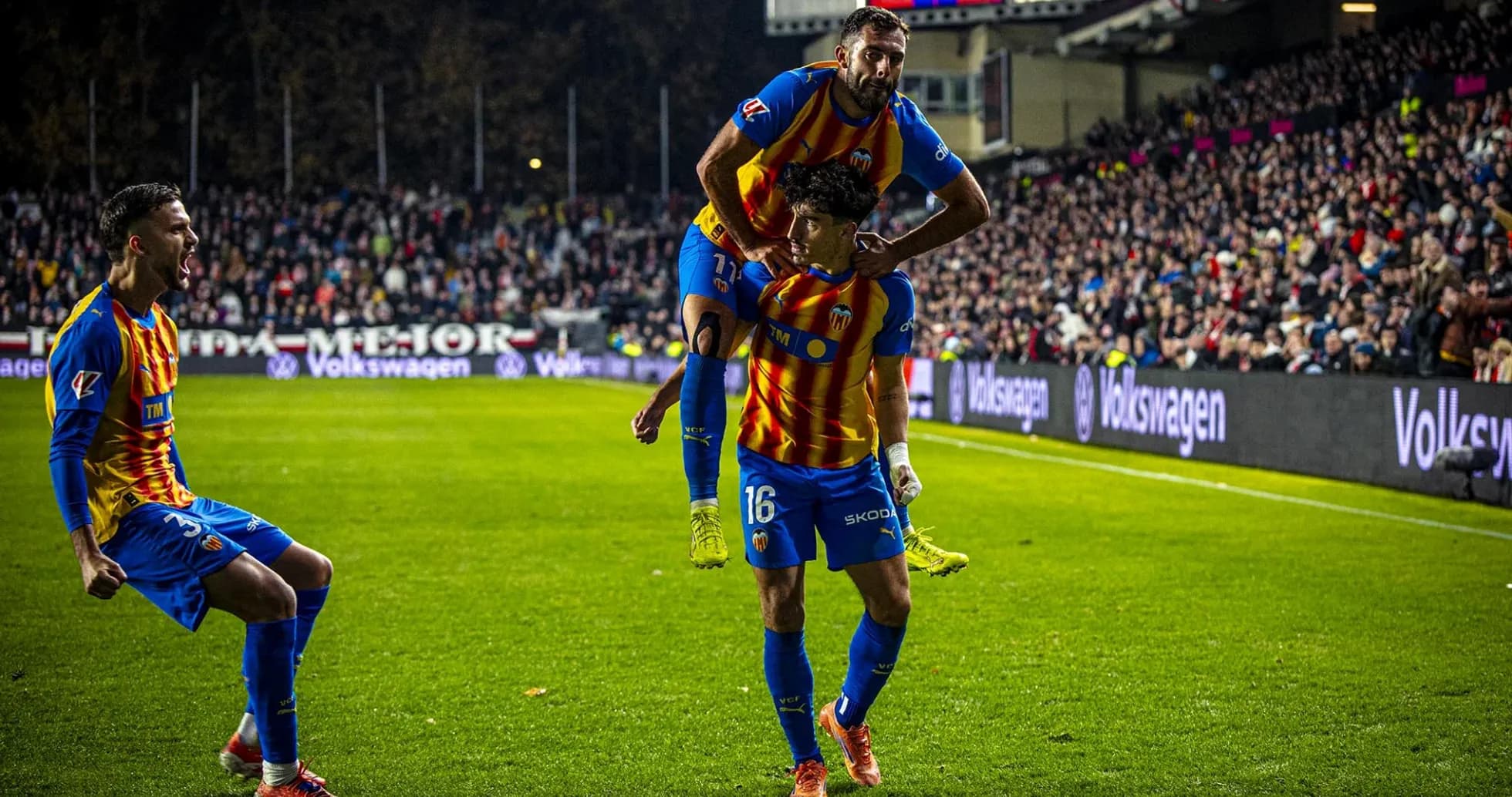 Valencia players celebrating a goal during match Valencia players celebrating a goal during match