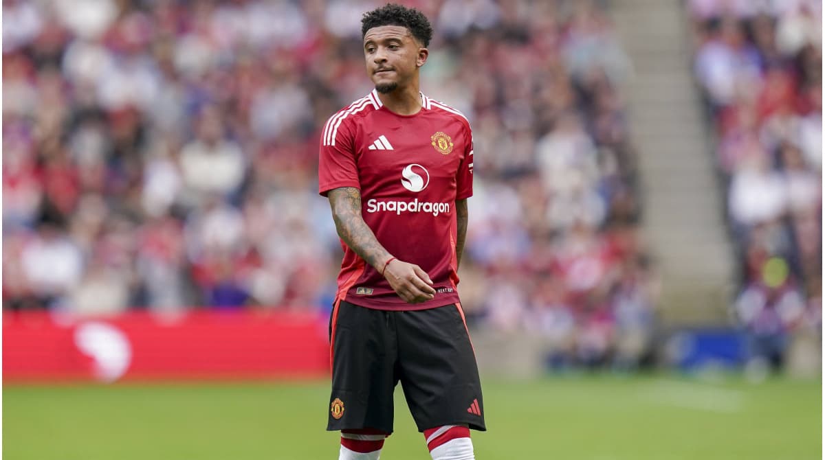 Jadon Sancho in Manchester United kit on pitch Jadon Sancho in Manchester United kit on pitch
