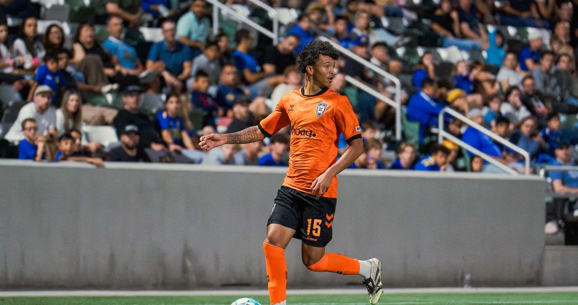 Player in orange jersey during USL match Player in orange jersey during USL match