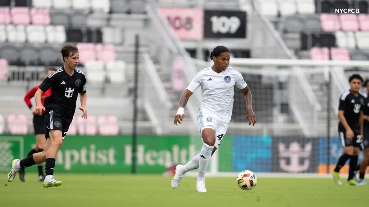 Inter Miami II player dribbling past opponent Inter Miami II player dribbling past opponent