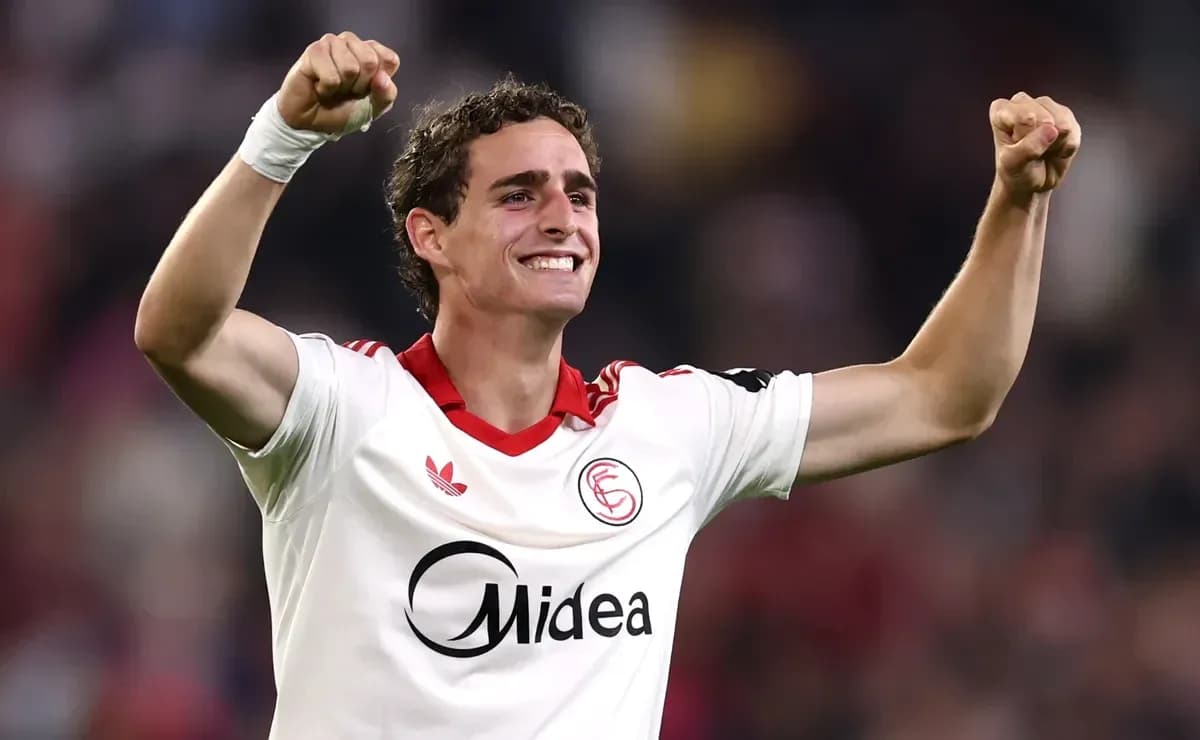 Sevilla player celebrating after a goal Sevilla player celebrating after a goal