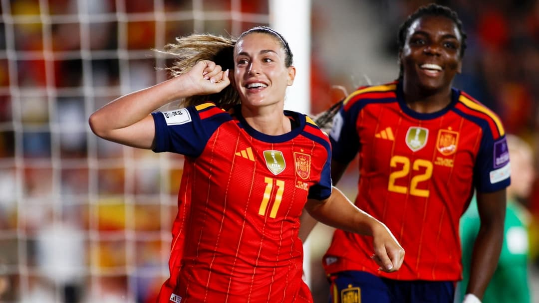 Spanish players celebrating a goal during a match Spanish players celebrating a goal during a match