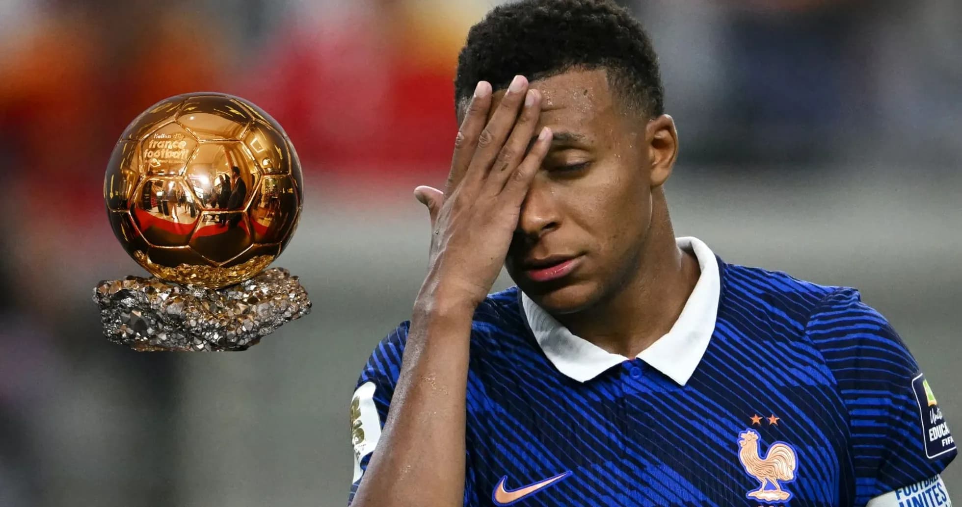 Player in France kit reacting near Ballon d'Or trophy Player in France kit reacting near Ballon d'Or trophy