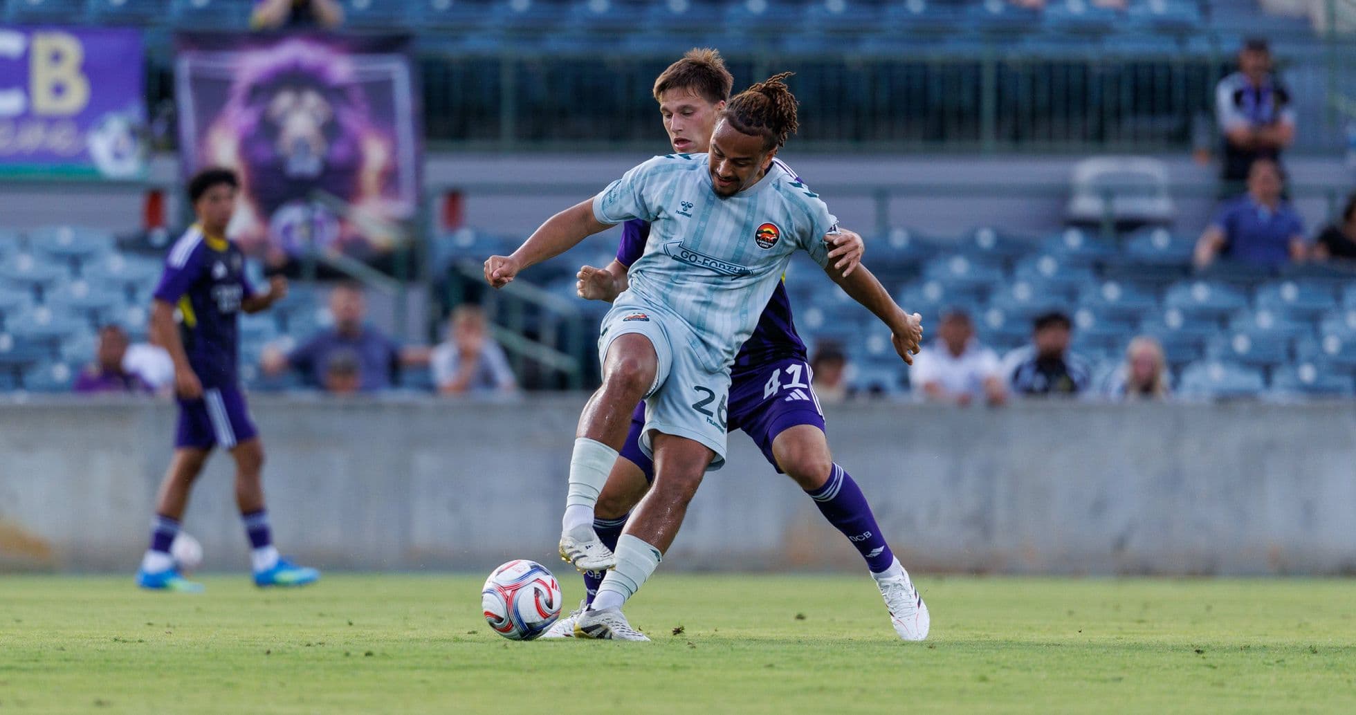 Players competing for the ball during Orlando City II match Players competing for the ball during Orlando City II match