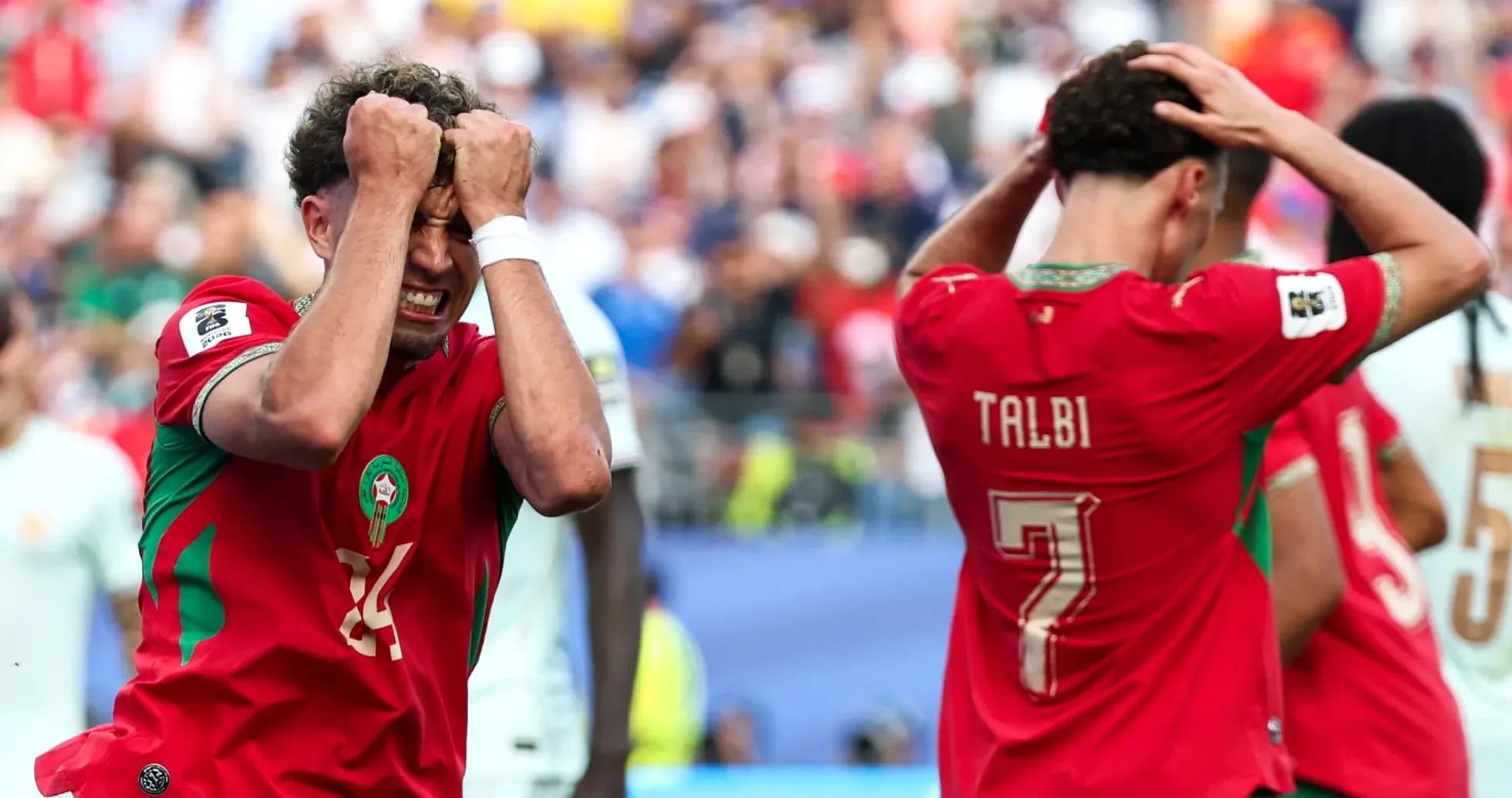 Moroccan players react after missed opportunity during match Moroccan players react after missed opportunity during match