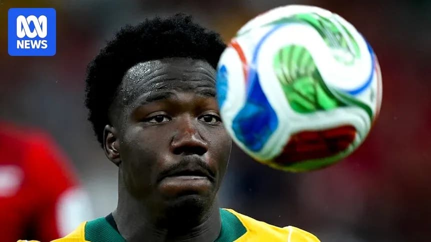 Player concentrating on the soccer ball in motion Player concentrating on the soccer ball in motion