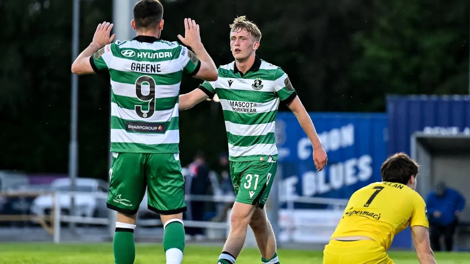 Players celebrating after scoring during a match Players celebrating after scoring during a match